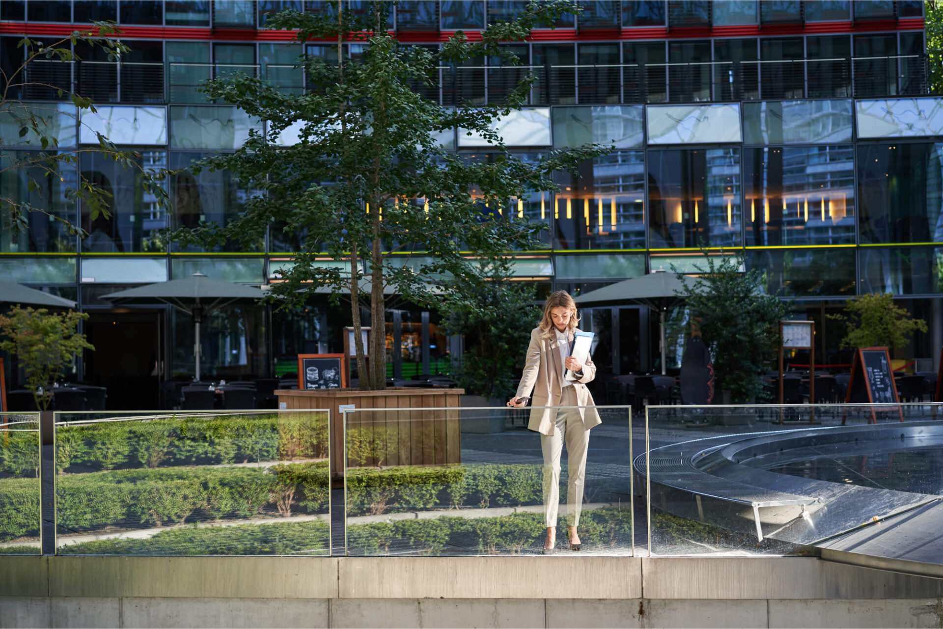 Maximizing Revenue with Strategic Placement of Automatic Snacks Vending Machines 3 corporate businesswoman beige suit silhouette young corporate woman with documents laptop